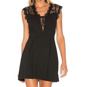 BCBG black eyelet lace dress. With pockets!!